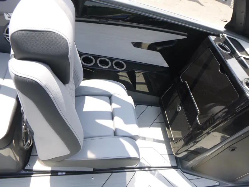 Slide: The Image of Interior of 2025 Yamaha Boats 222XD, featuring sleek seating and modern design elements. - 8