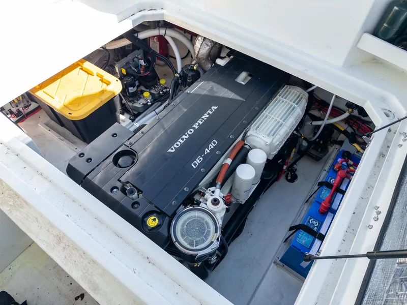 Slide: The Image of Engine compartment of 2021 Ocean Sport 26/27 with Volvo Penta D6-440 engine. - 15