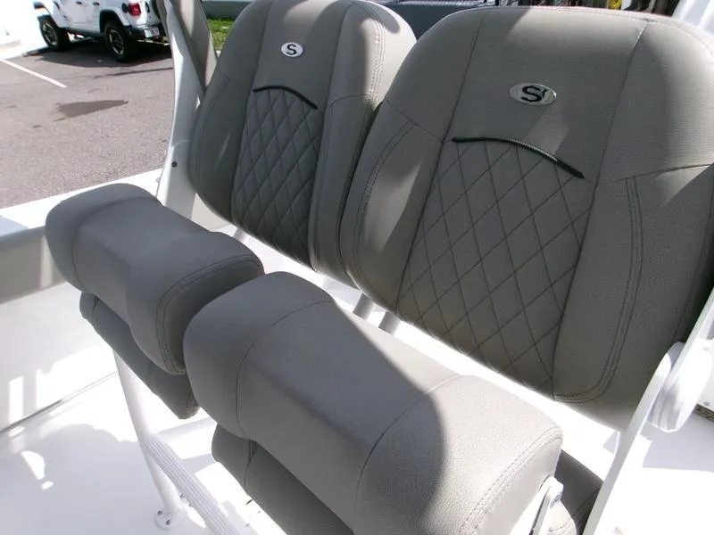 Slide: The Image of 2026 Sportsman Open 232 boat seats with diamond stitching and armrests. - 10