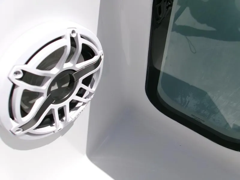 Slide: The Image of Close-up of a speaker on a 2026 Sportsman Open 232 boat. - 11