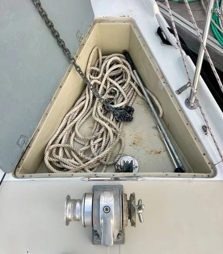 Slide: The Image of Anchor locker of 1987 Ericson 34 2 sailboat with rope and chain. - 29