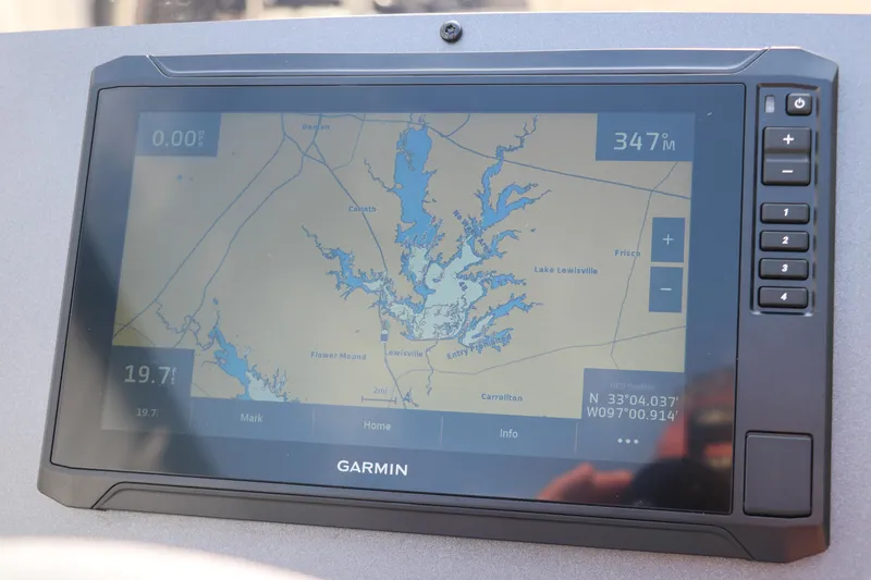 Slide: The Image of Garmin GPS display on 2025 Vexus AVX1980, showing Lake Lewisville map and coordinates. - 13