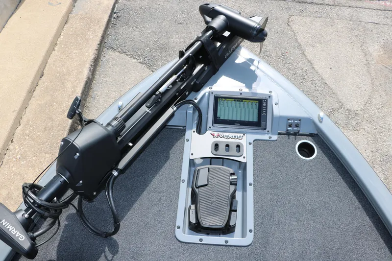 Slide: The Image of 2025 Vexus AVX1980 boat with Garmin equipment and foot pedal on deck. - 16