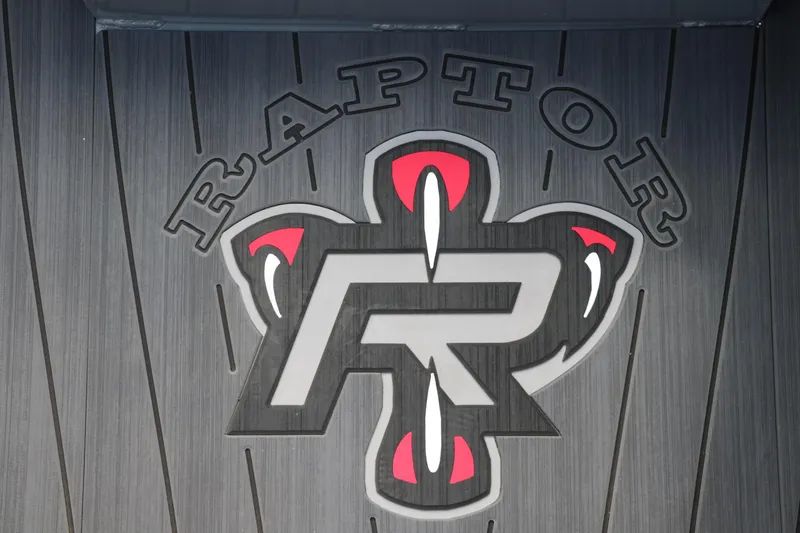 Slide: The Image of Raptor logo on Vexus AVX1980 boat, 2025 model, featuring bold design elements. - 19