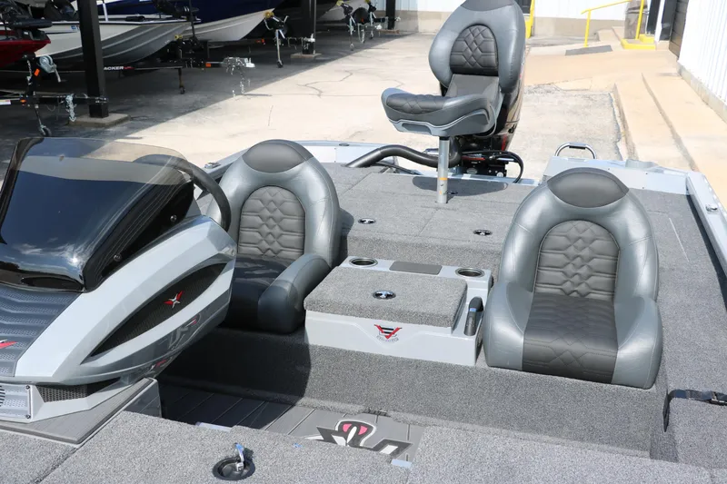 Slide: The Image of 2025 Vexus AVX1980 boat interior with gray seating and modern design. - 23