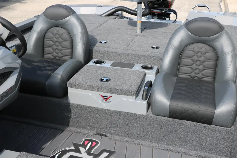 Slide: The Image of 2025 Vexus AVX1980 boat interior with gray leather seats and carpeted flooring. - 25