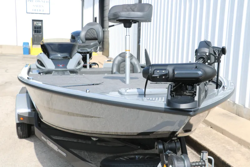 Slide: The Image of 2025 Vexus AVX1980 boat with advanced features, parked outdoors. - 5