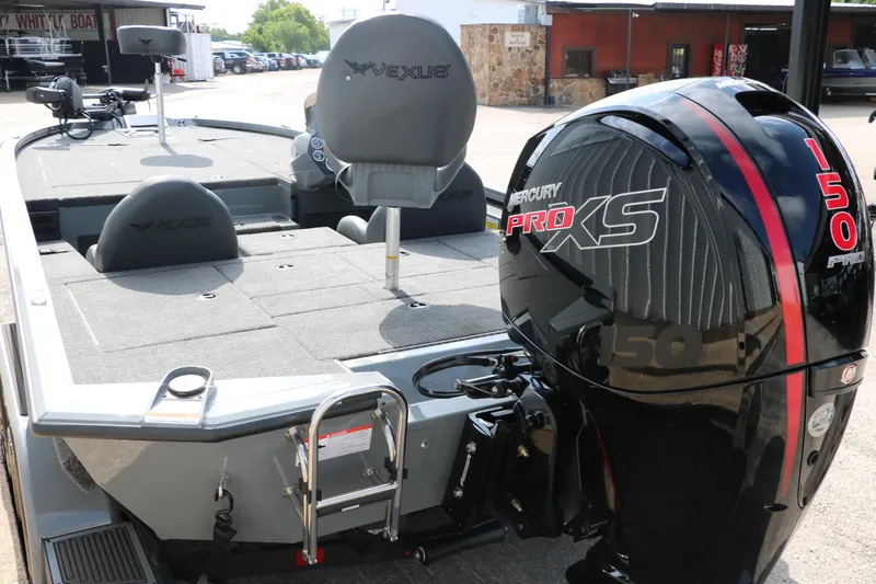 Slide: The Image of 2025 Vexus AVX1980 boat with Mercury Pro XS 150 engine, rear view. - 7