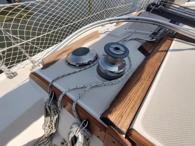 Slide: The Image of Deck of 1986 Catalina C-34 sailboat with winch and ropes. - 25