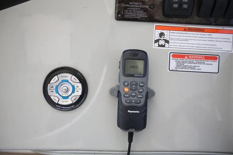 Slide: The Image of Control panel and Raymarine device on 2010 Sea Ray 390 Sundancer boat. - 13