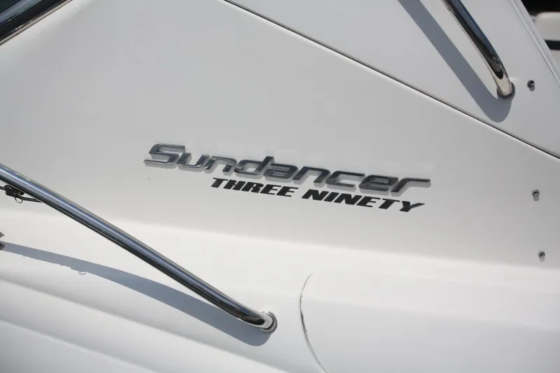 Slide: The Image of Sea Ray 390 Sundancer 2010 boat emblem with chrome railing detail. - 4