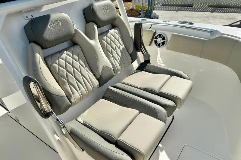 Slide: The Image of 2025 Key West 291 FS boat seats with quilted design and armrests. - 20