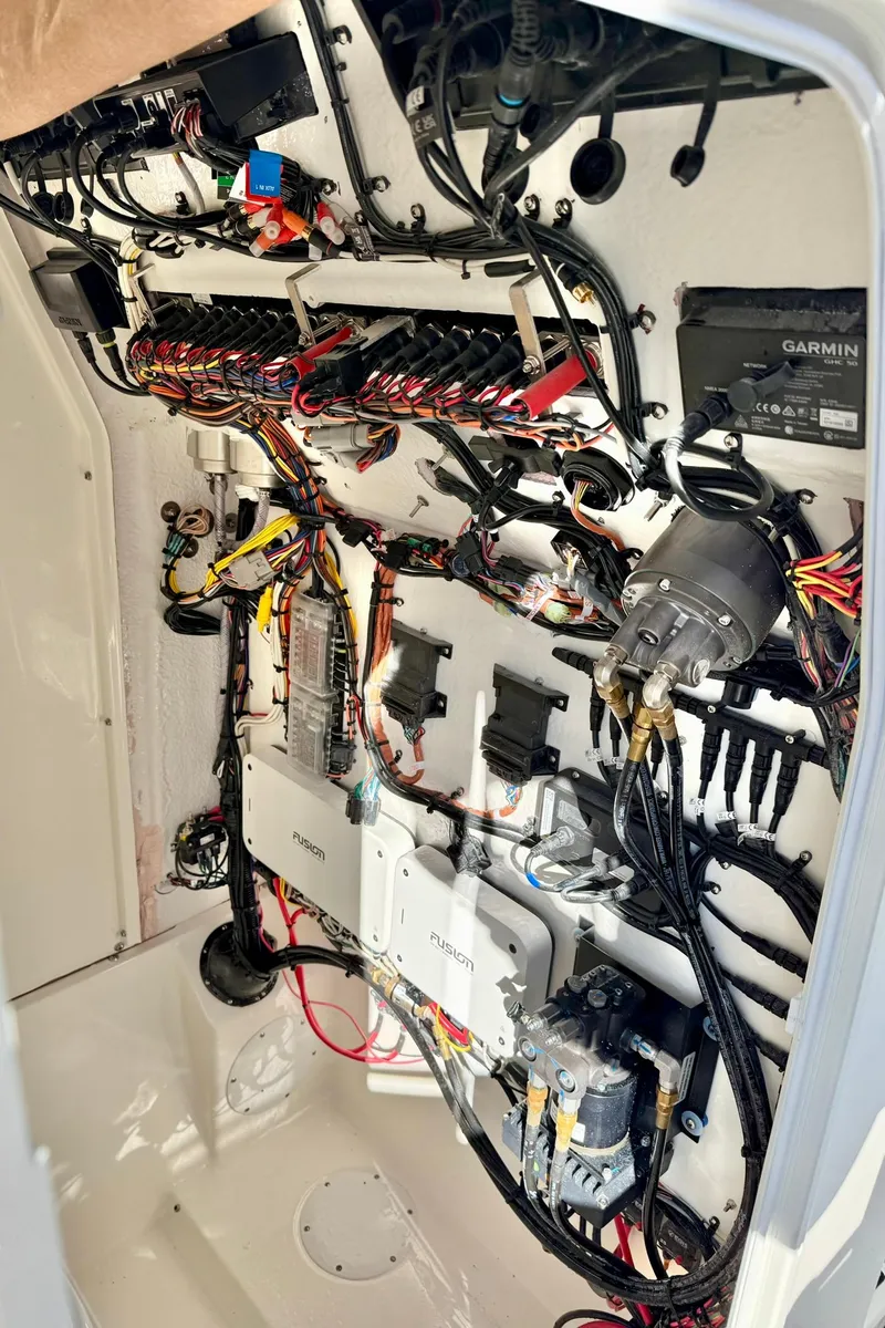 Slide: The Image of Electrical wiring and components inside a 2025 Key West 291 FS boat. - 47