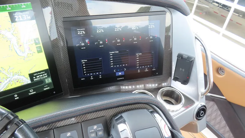 Slide: The Image of Dashboard of 2022 MTI 50v boat with navigation and control screens. - 16