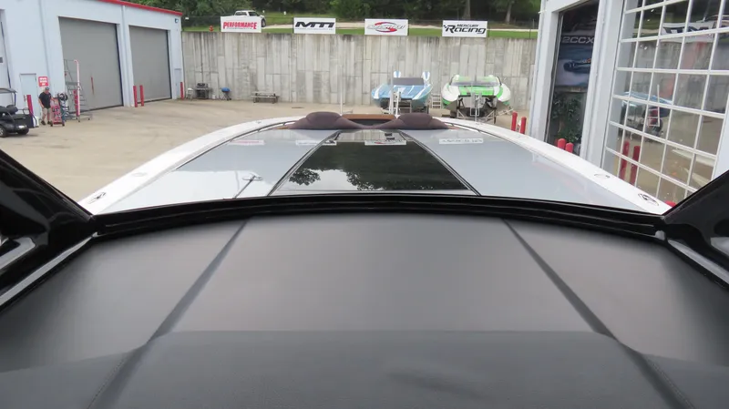 Slide: The Image of 2022 MTI 50v boat in a garage, showcasing sleek design and performance features. - 18