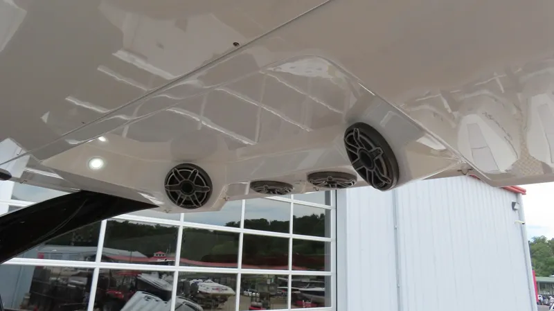 Slide: The Image of MTI 50v 2022 boat speakers and lights under canopy, exterior view. - 21