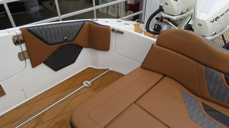 Slide: The Image of Luxurious MTI 50v boat interior with brown leather seating, 2022 model. - 23