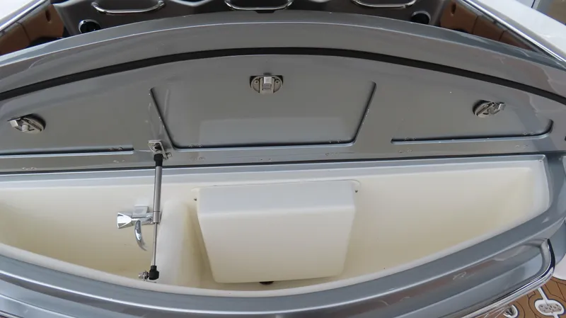 Slide: The Image of Open storage compartment on a 2022 MTI 50v boat, showcasing interior details. - 25