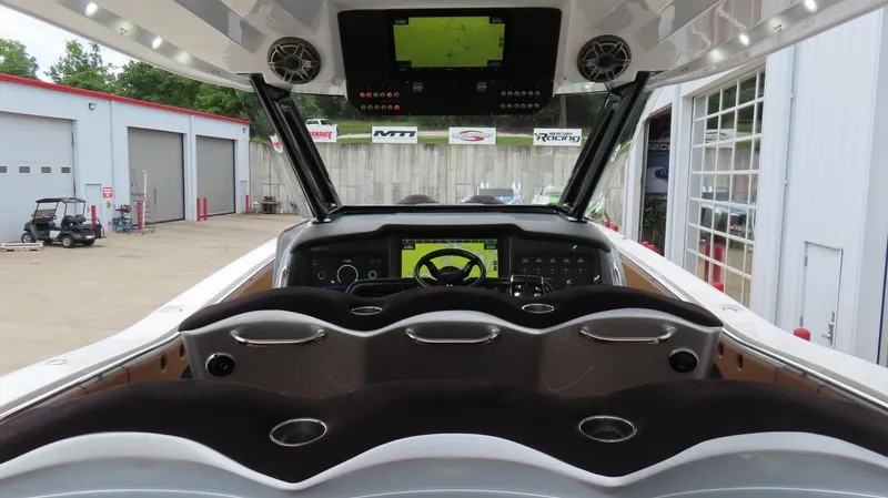 Slide: The Image of Interior view of 2022 MTI 50v boat cockpit with advanced navigation systems. - 26
