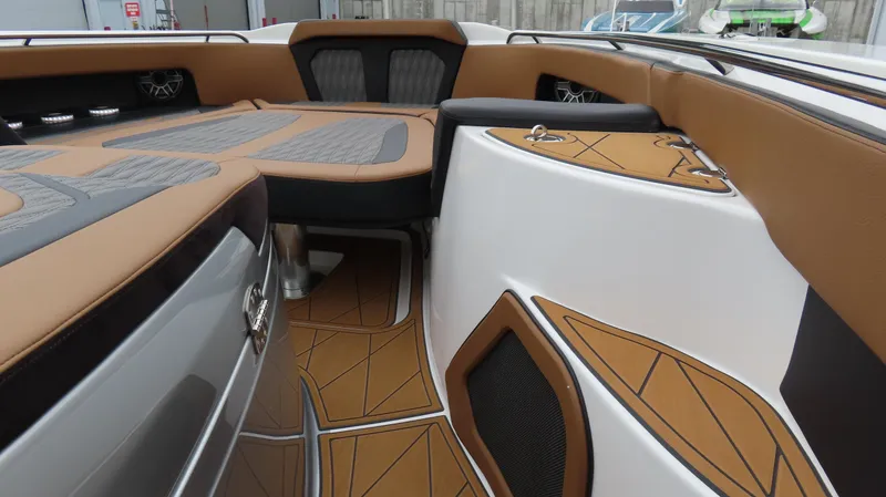 Slide: The Image of Luxurious interior of 2022 MTI 50v boat with tan and gray seating. - 31
