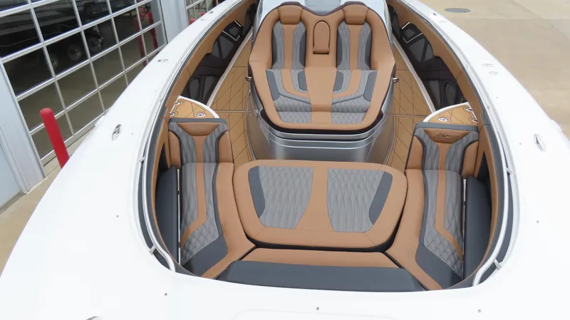 Slide: The Image of Luxurious interior of 2022 MTI 50v boat with stylish tan and gray seating. - 35