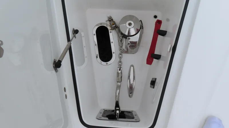 Slide: The Image of Anchor locker of 2022 MTI 50v boat with chain and cleat. - 36