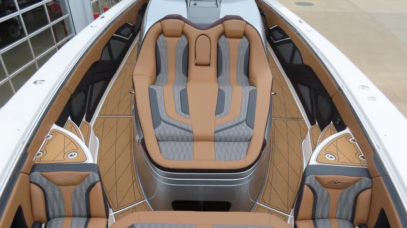 Slide: The Image of Luxurious MTI 50v 2022 boat interior with tan and gray seating, modern design. - 37