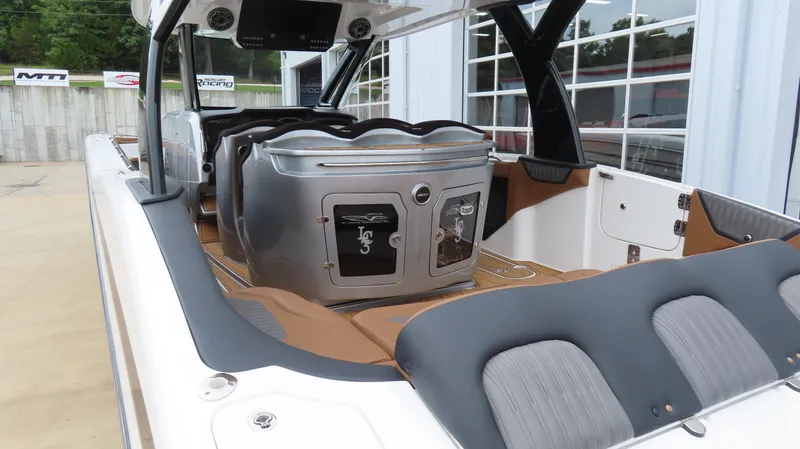 Slide: The Image of 2022 MTI 50v boat interior with sleek seating and modern design features. - 6