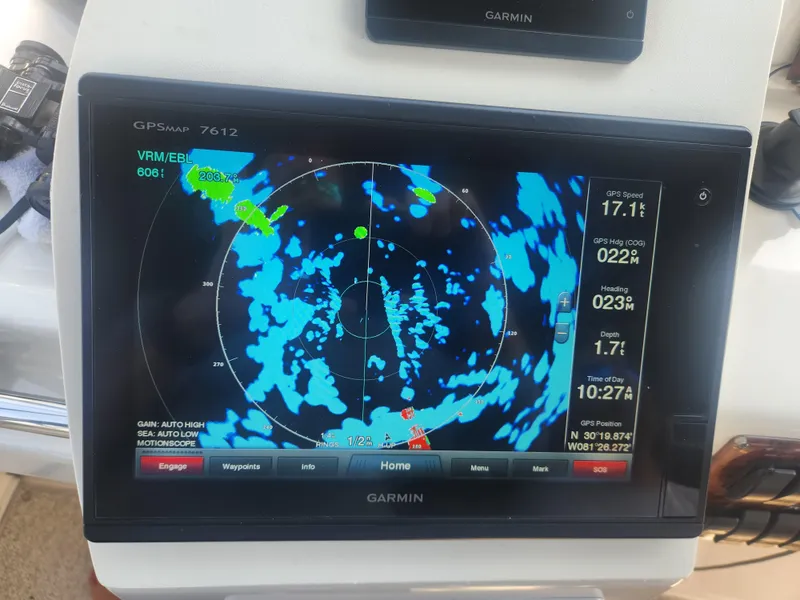 Slide: The Image of Garmin GPS display on 2000 Silverton 453 Motor Yacht showing navigation data. - 11