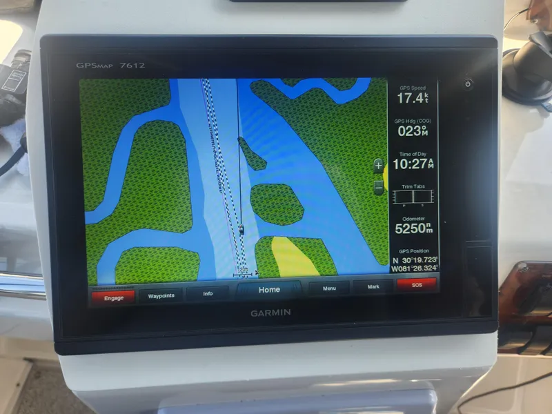 Slide: The Image of Garmin GPS display on 2000 Silverton 453 Motor Yacht showing navigation map and speed. - 14