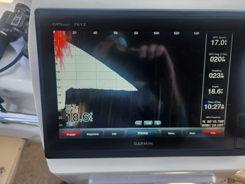 Slide: The Image of Garmin GPS display on 2000 Silverton 453 Motor Yacht showing speed, heading, and depth. - 15
