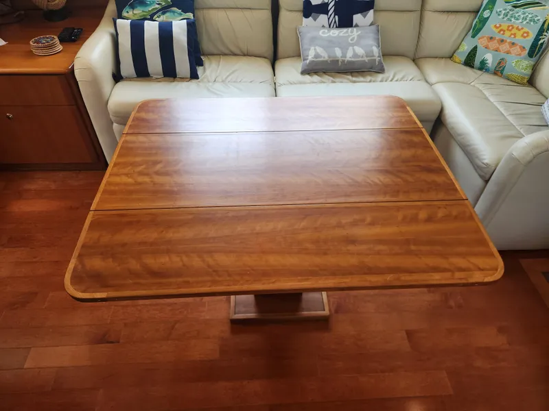 Slide: The Image of Interior of 2000 Silverton 453 Motor Yacht with TV, shelves, and lamp. - 41