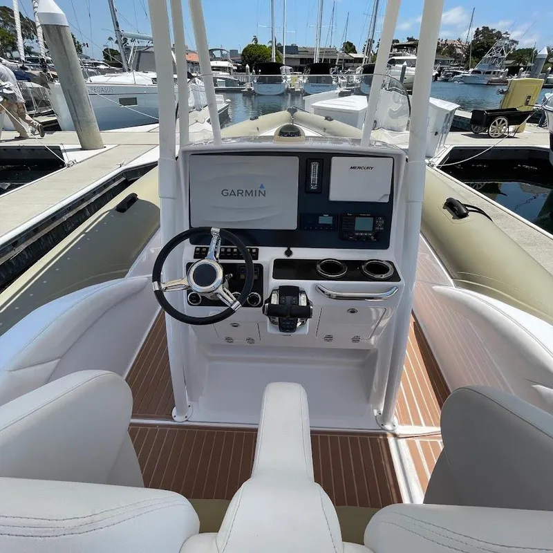 Slide: The Image of Cockpit of 2016 Airship 330 boat with Garmin navigation system at marina. - 10