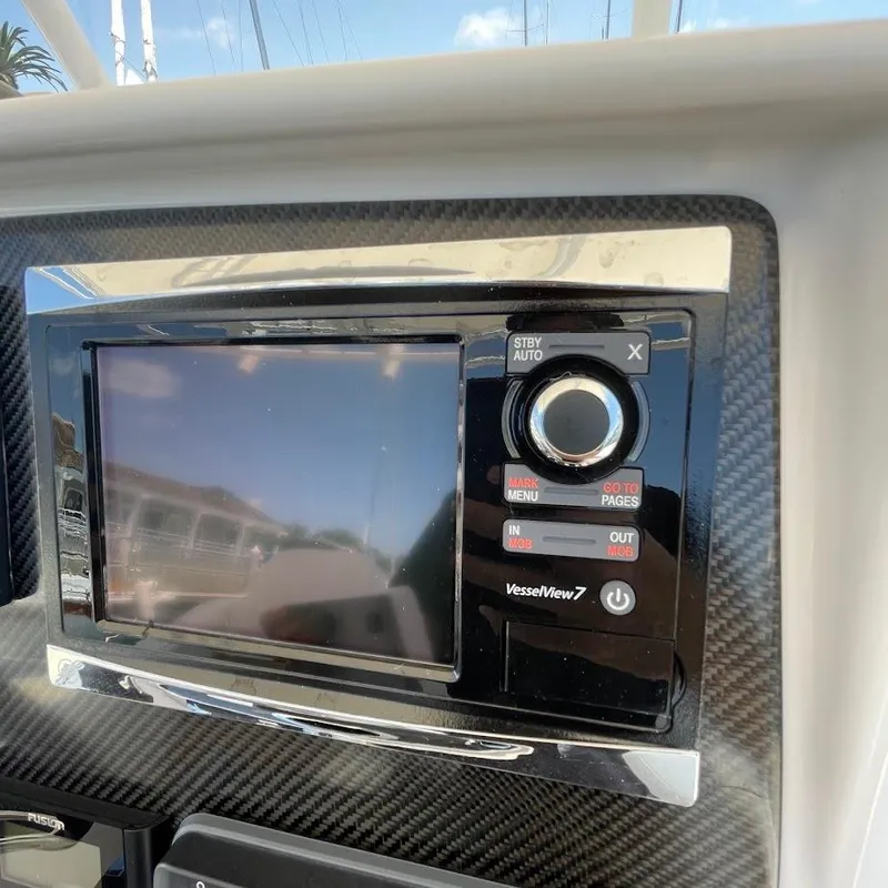 Slide: The Image of Airship 330 2016 dashboard with VesselView 7 display and control panel. - 12