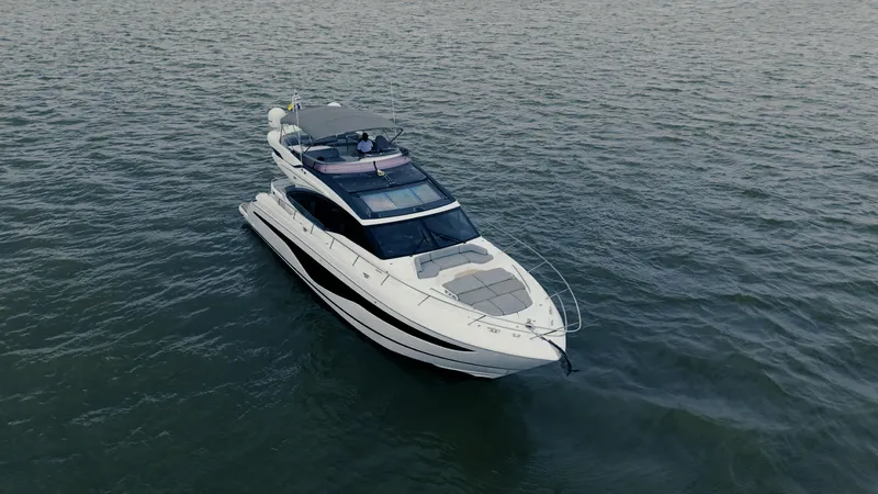 Slide: The Image of Luxury 2020 Princess S62 yacht cruising on open water. - 10