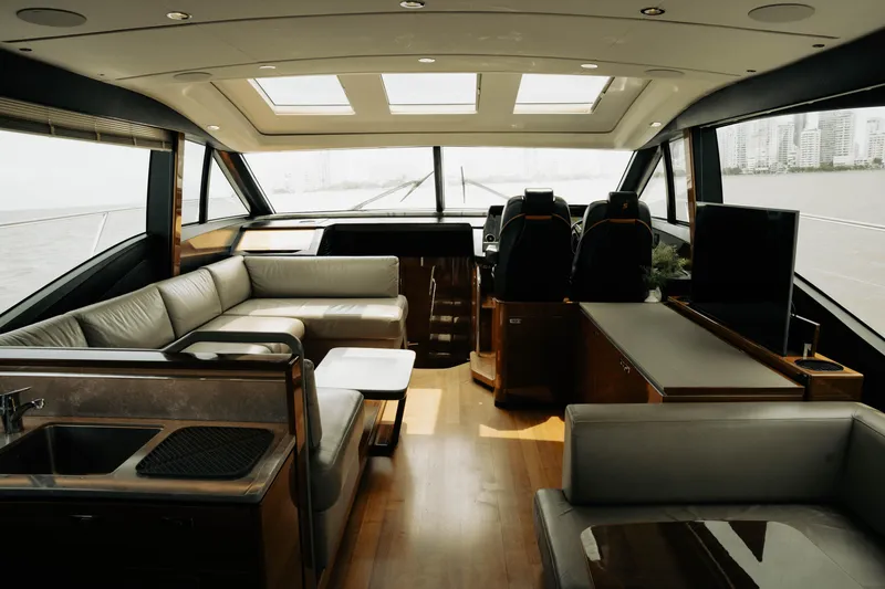 Slide: The Image of Luxurious interior of 2020 Princess S62 yacht with modern seating and panoramic windows. - 20