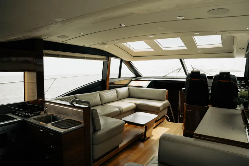 Slide: The Image of Luxurious interior of 2020 Princess S62 yacht with modern seating and panoramic windows. - 24