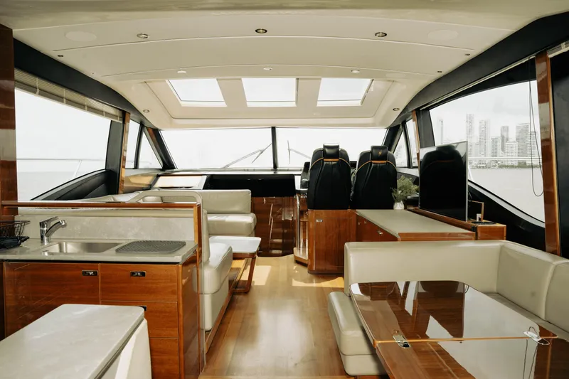 Slide: The Image of Luxurious interior of a 2020 Princess S62 yacht with modern furnishings and panoramic windows. - 26