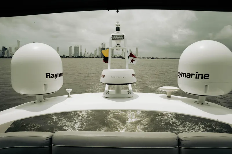 Slide: The Image of 2020 Princess S62 yacht with Raymarine equipment, cruising near city skyline. - 43
