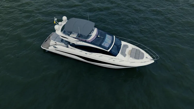 Slide: The Image of Luxury 2020 Princess S62 yacht cruising on open water. - 6