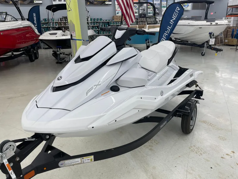 Slide: The Image of 2025 Yamaha WaveRunner FX Cruiser SVHO in showroom, white color, on trailer. - 7