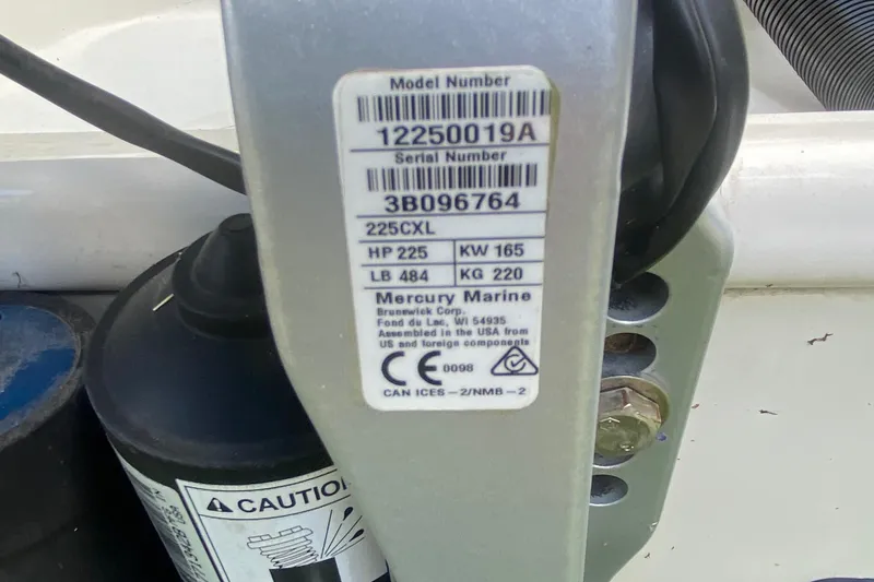 Slide: The Image of Label on a 2022 Boston Whaler 250 Outrage, featuring Mercury Marine engine specifications. - 28