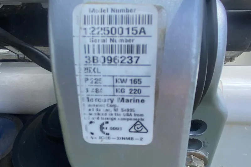 Slide: The Image of Label on a 2022 Boston Whaler 250 Outrage boat engine component. - 29
