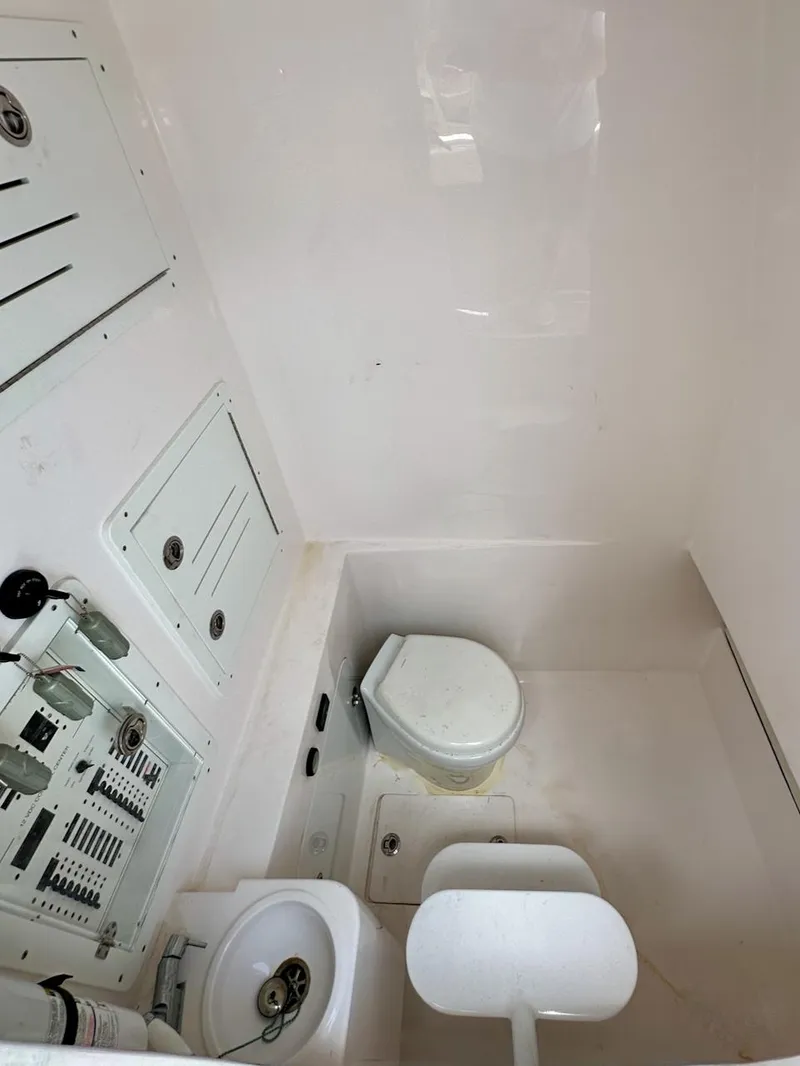 Slide: The Image of Compact bathroom in 2021 Streamline 35CC boat with toilet and sink. - 29