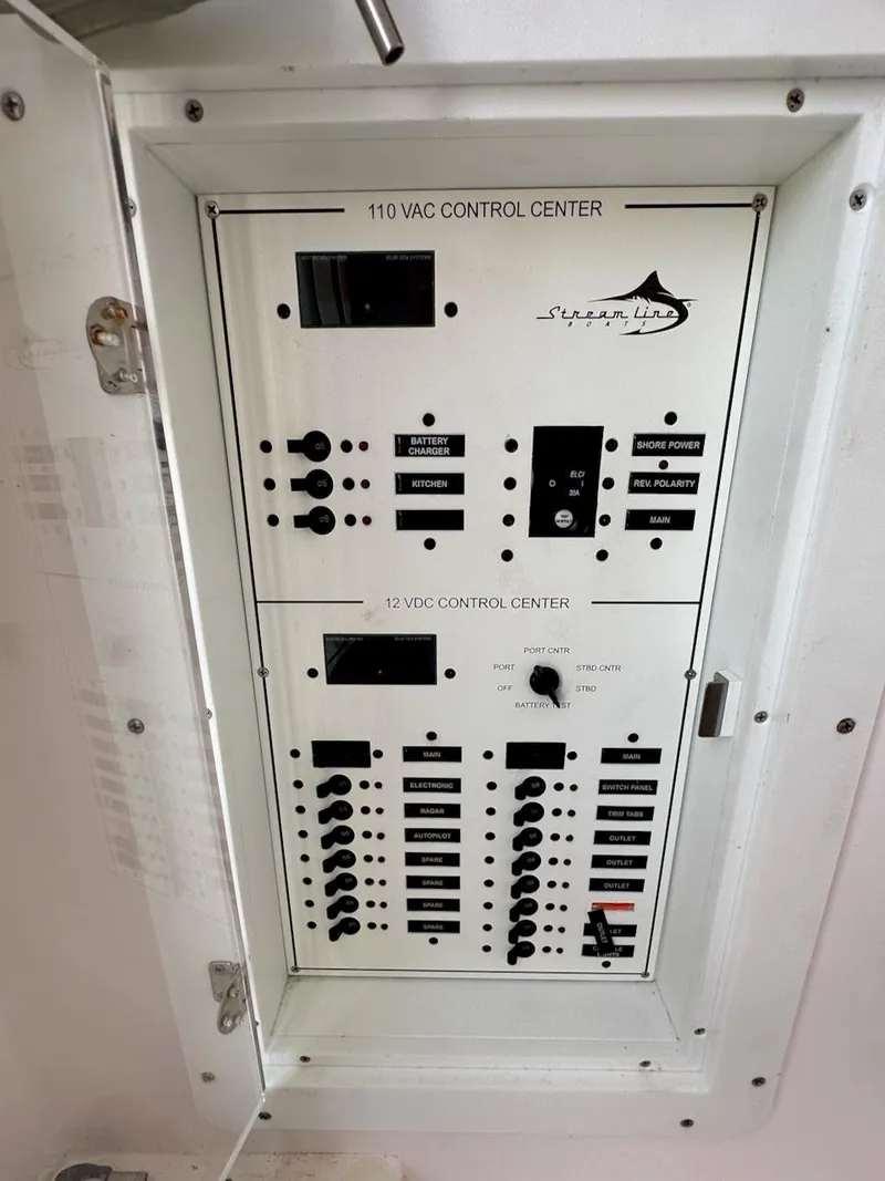 Slide: The Image of Electrical control panel for Streamline 35CC, 2021 model, featuring 110 VAC and 12 VDC systems. - 32