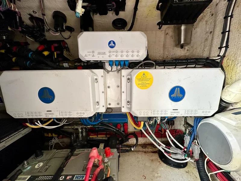 Slide: The Image of Electrical system setup in a 2021 Streamline 35CC boat, featuring JL Audio components. - 34