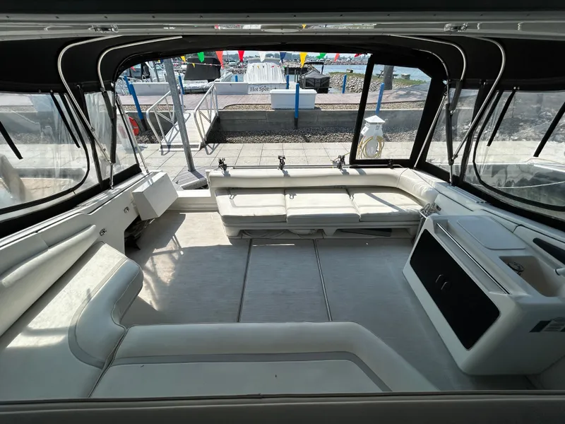 Slide: The Image of 1993 Sea Ray 440 Sundancer interior with spacious seating and modern design. - 17