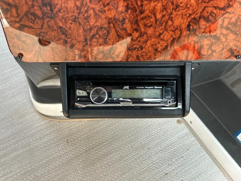 Slide: The Image of Interior of 1993 Sea Ray 440 Sundancer yacht with kitchen and modern amenities. - 42