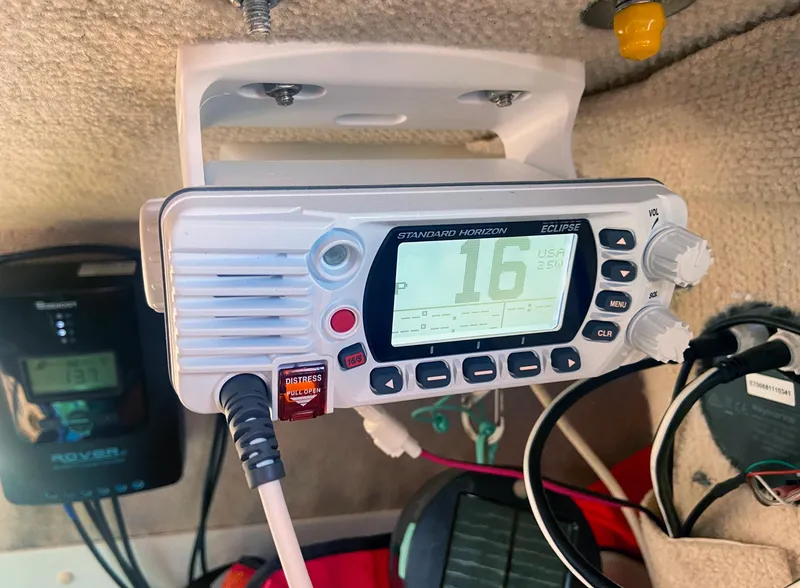 Slide: The Image of VHF marine radio on Corsair F27, 1990 model, displaying channel 16. - 17