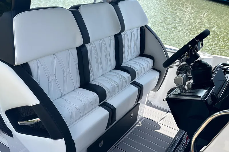 Slide: The Image of 2024 Nor-Tech 400 Supersport interior with luxurious seating and modern steering console. - 20